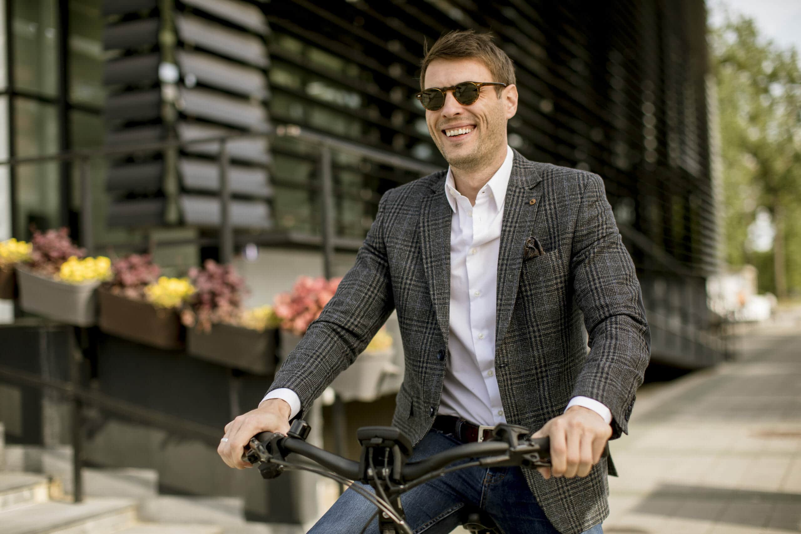 young businessman on the ebike 2022 04 19 01 53 46 utc scaled